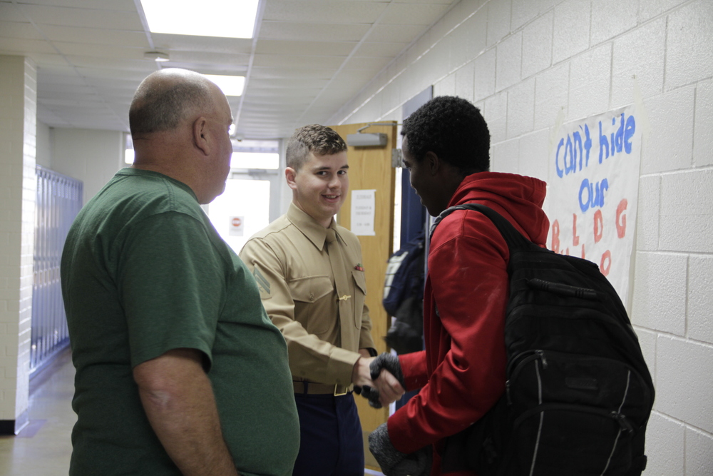 John Herring, Corporal Herring and student in hallway