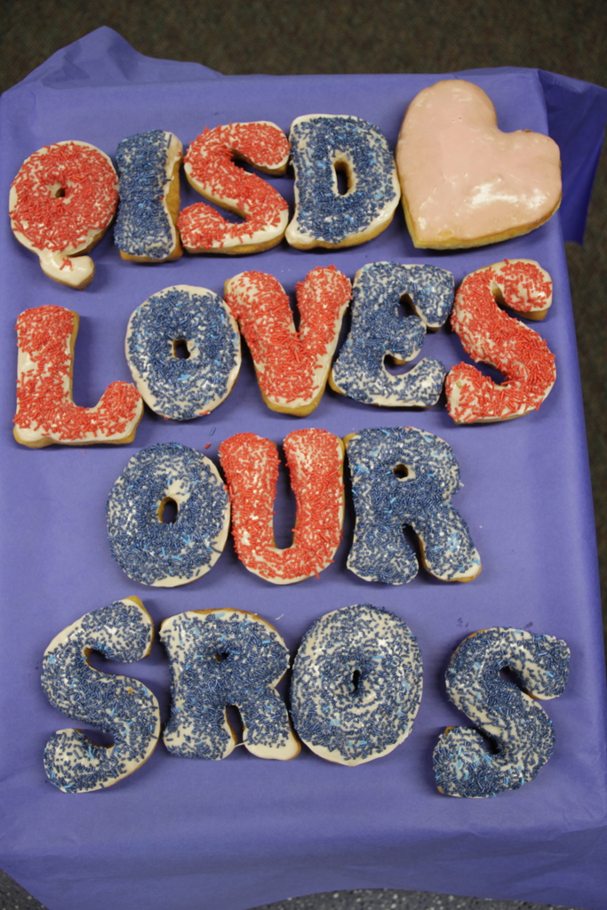 donuts that spell out qisd loves our sros