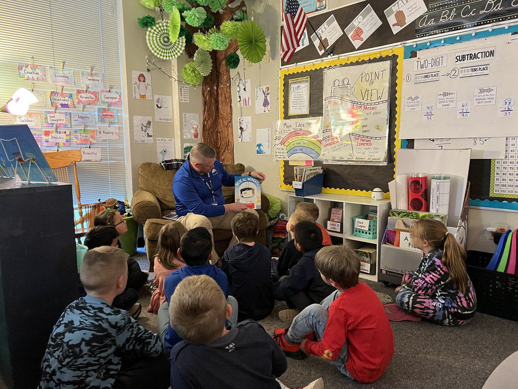 Superintendent Mason reading to 2nd graders