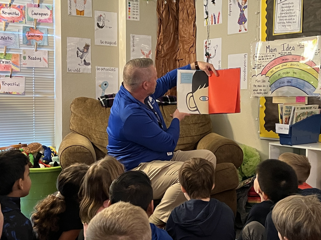 Superintendent Mason reading to second graders